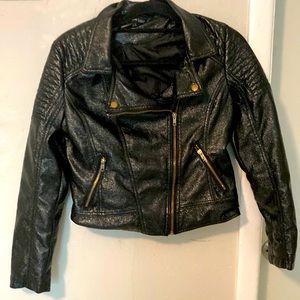 A black shiny leather jacket